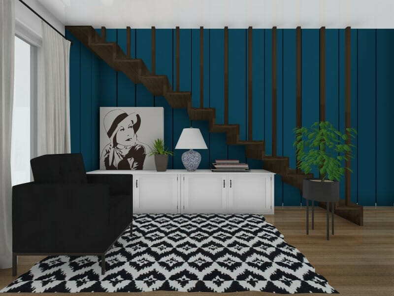 Staircase with blue accent wall