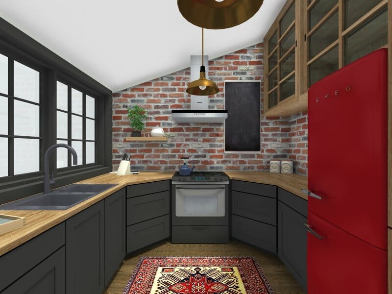 Small u-shaped kitchen with brick wall and red fridge
