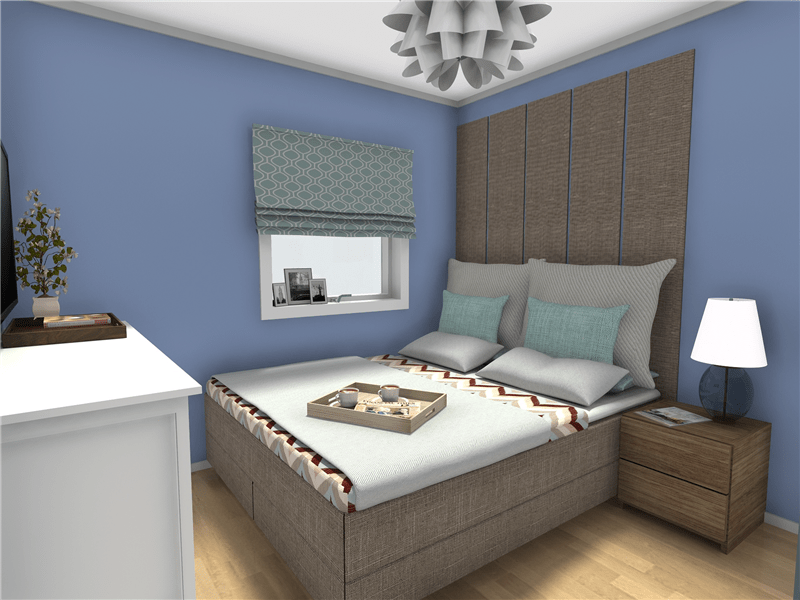 Apartment bedroom with blue walls